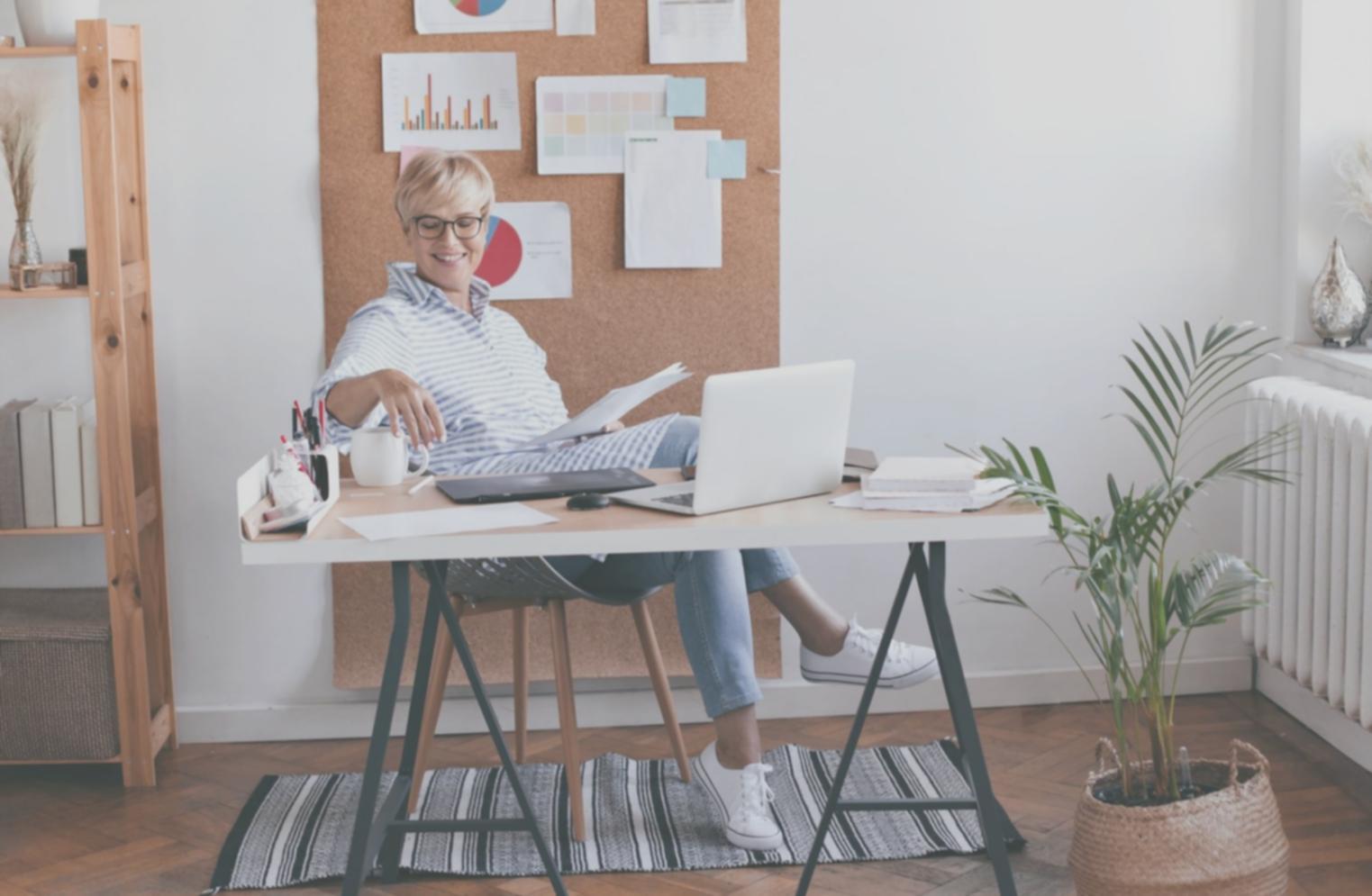 Professional event planning workspace with financial documents and planning materials